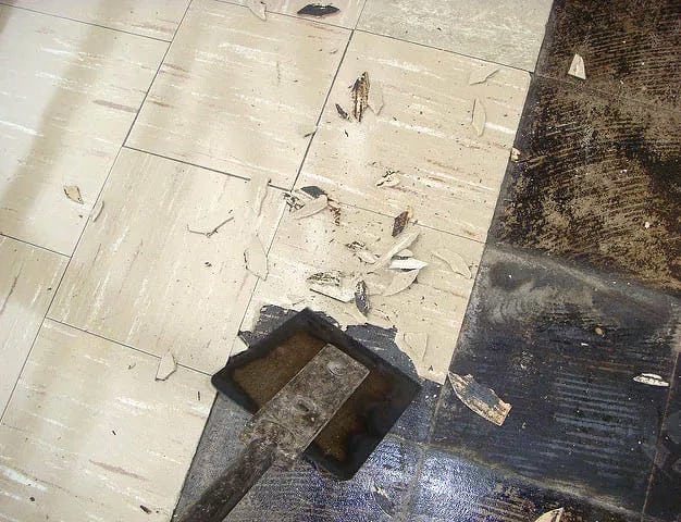 Asbestos backing on floor tiles